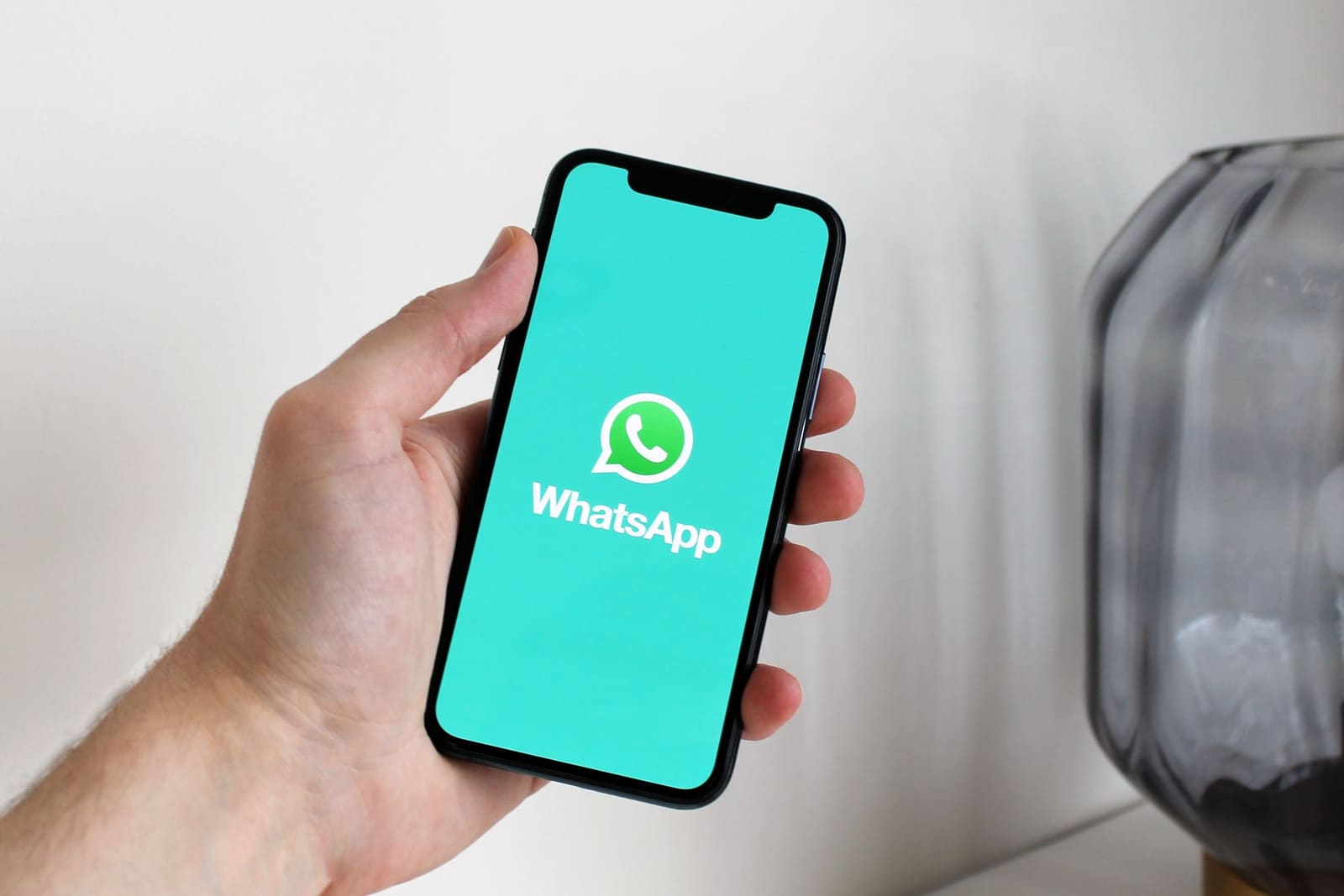 Phone with WhatsApp open